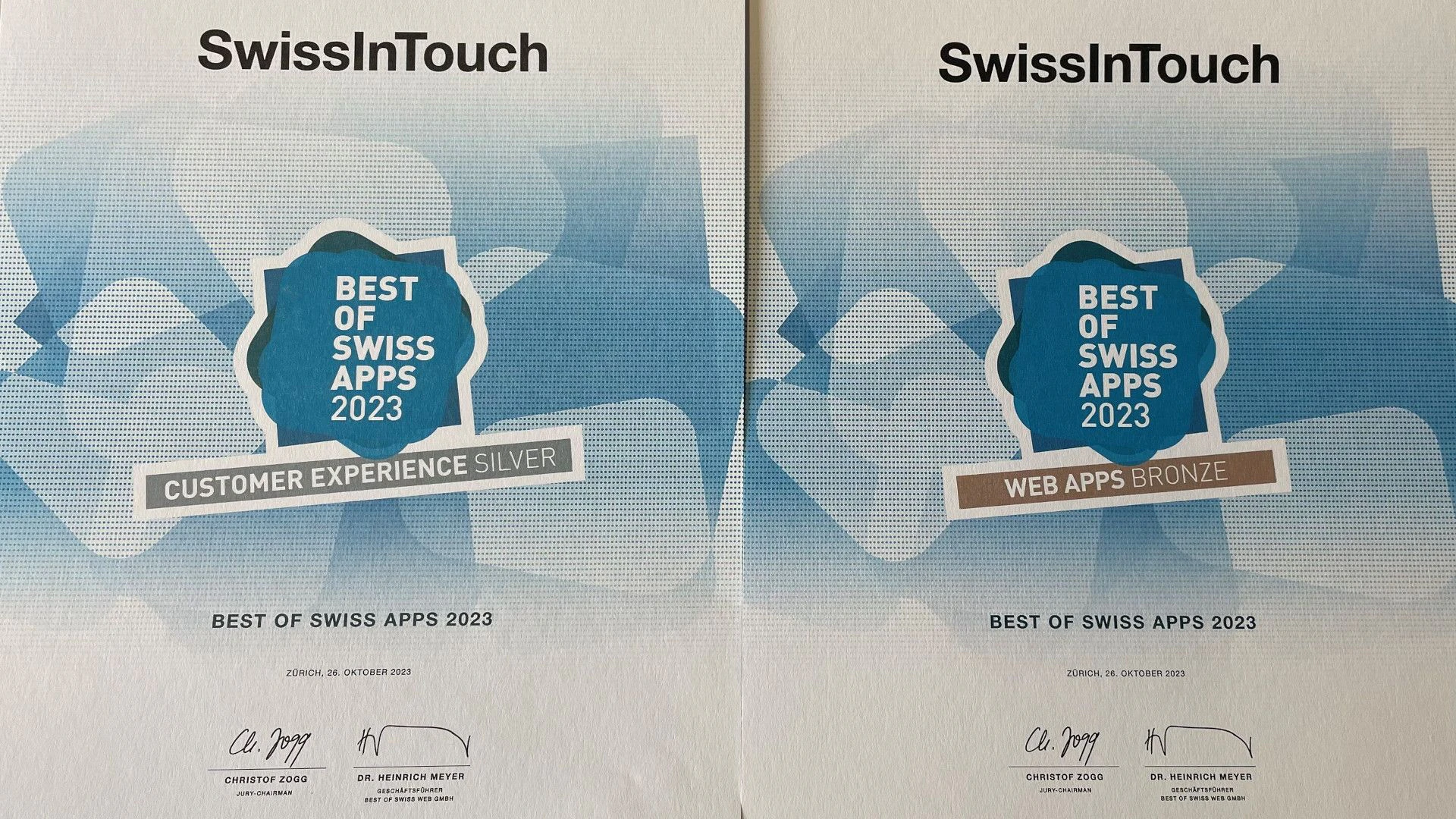 The picture shows the two awards silver and bronze at the Best of Swiss Apps Awards 2023.